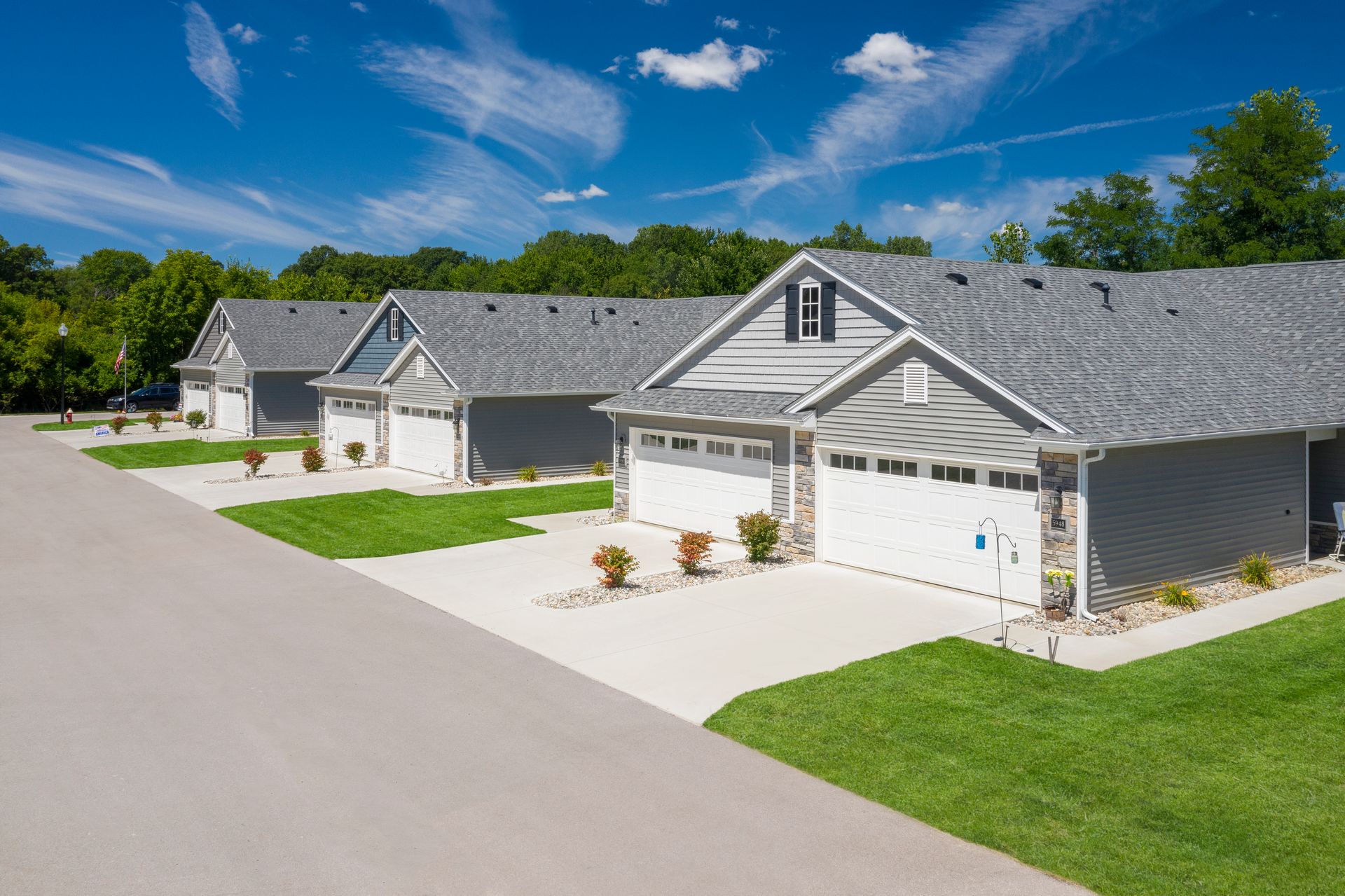 Photo of a row of three duplexes