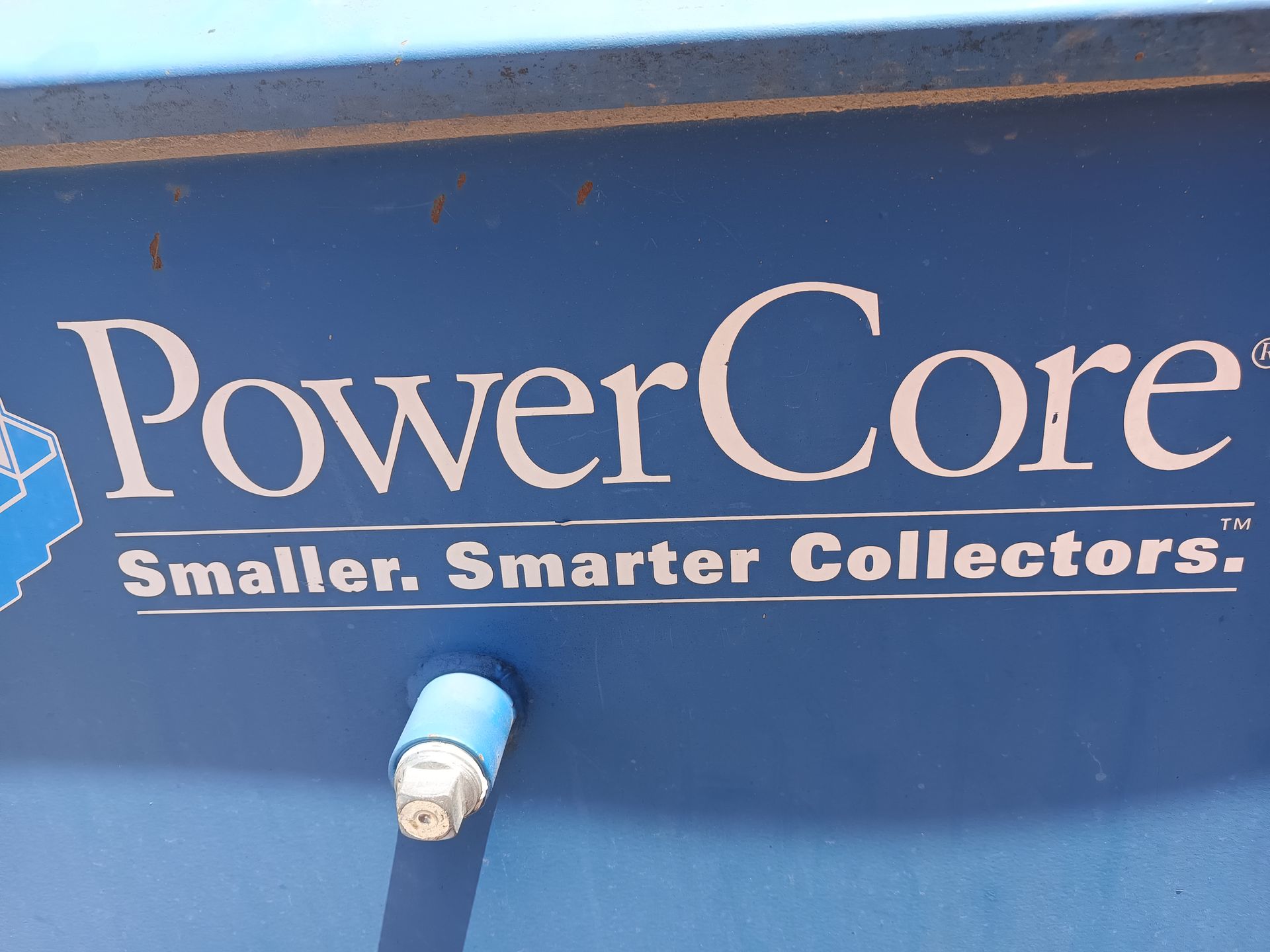 A blue sign that says powercore smaller smarter collectors