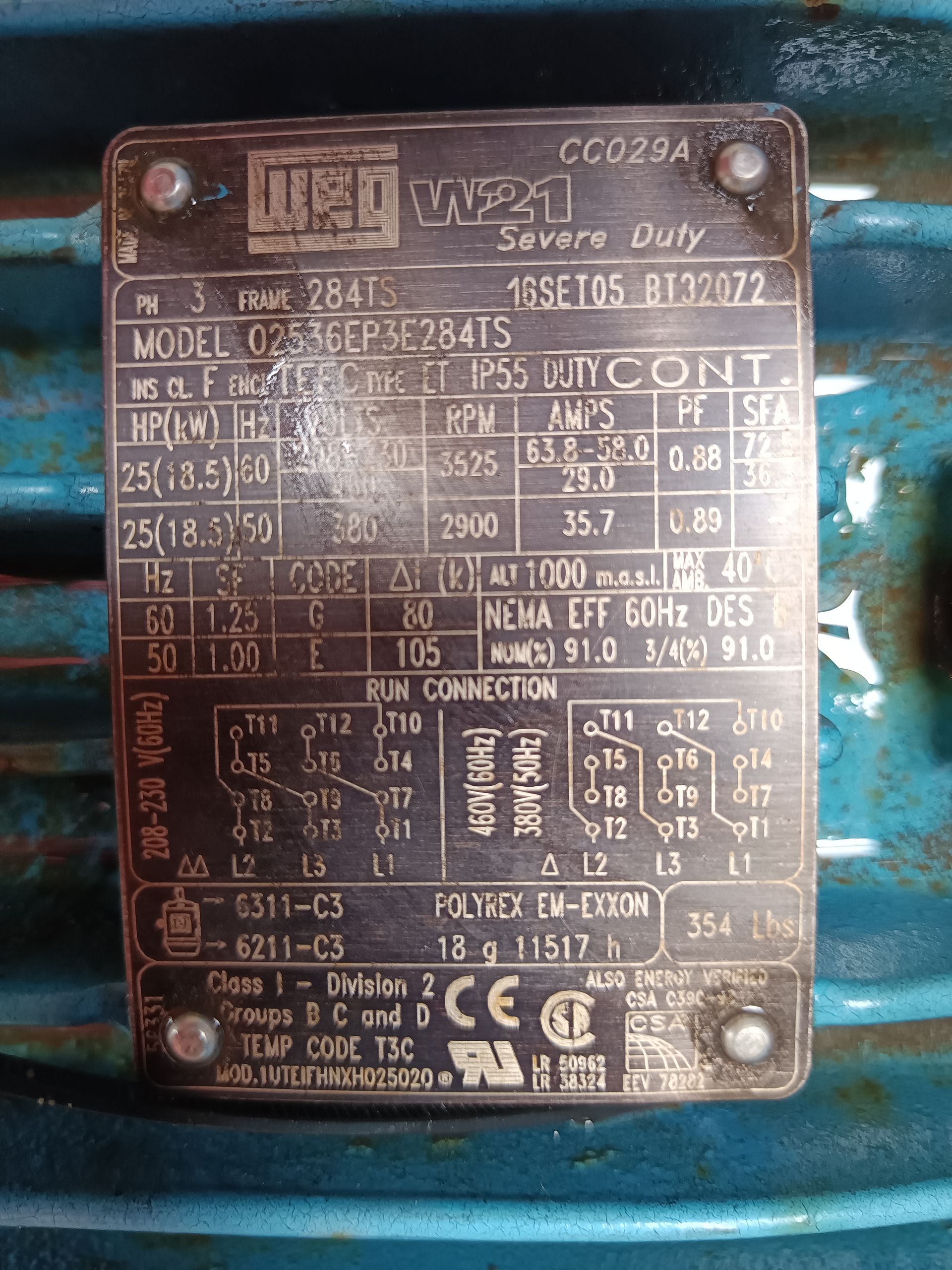 A close up of a label on a blue motor.