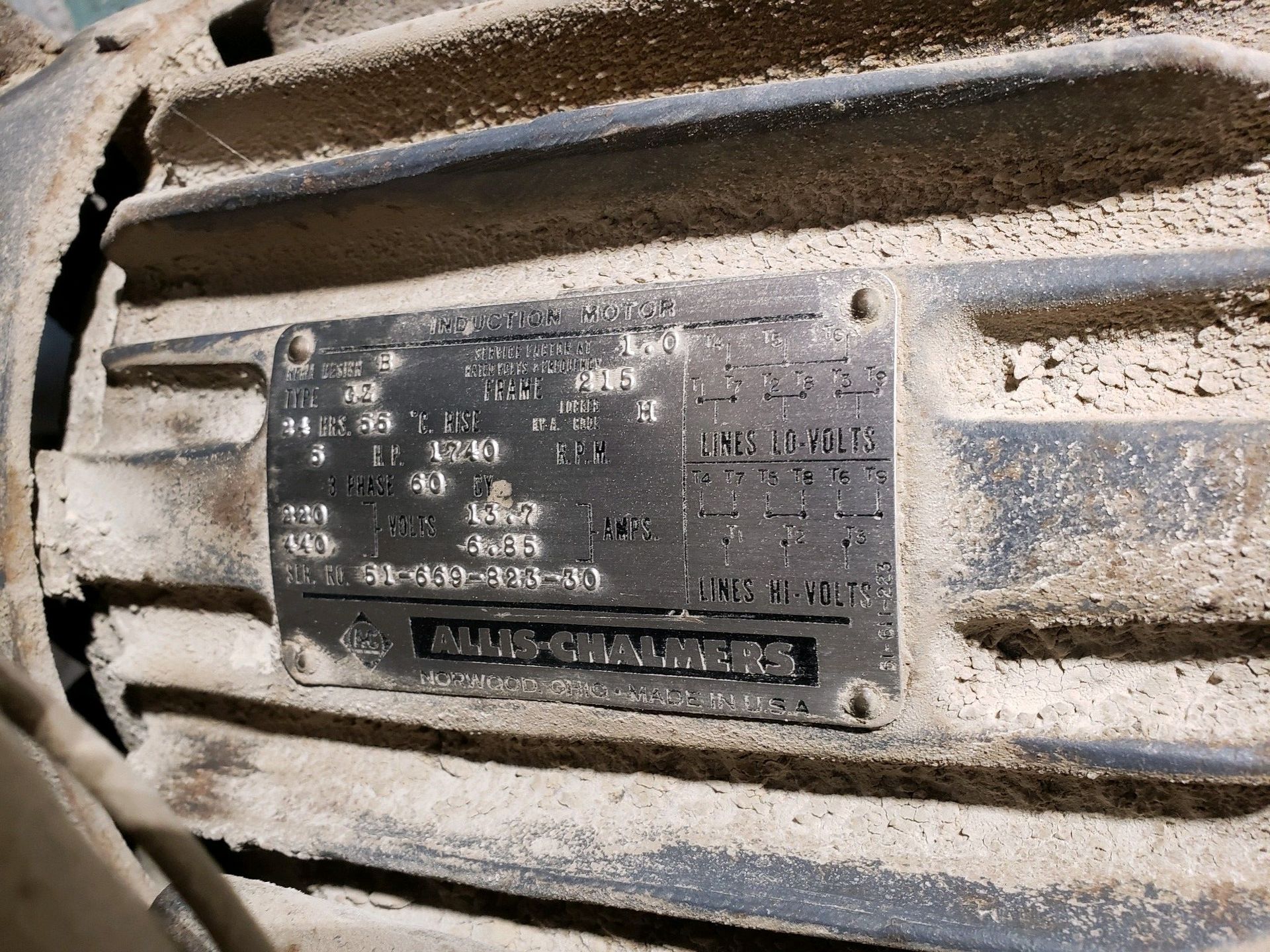 A close up of a motor with a label on it