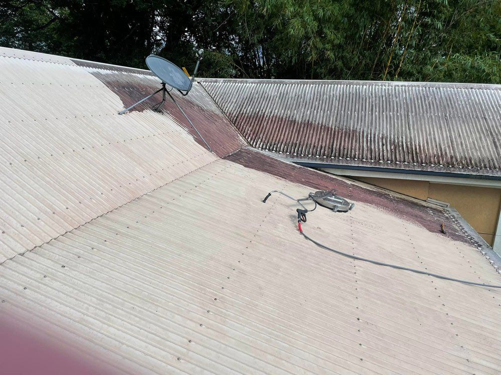 Roof Cleaning Using Pressure Washing Equipment — Aqua Teck In Douglas Shire, QLD