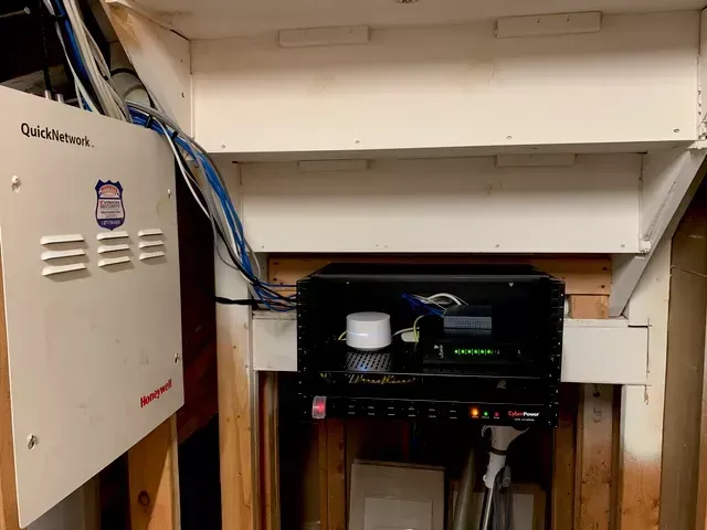 a newly installed white box with the word quick network on it where is the heart of the networking of the house