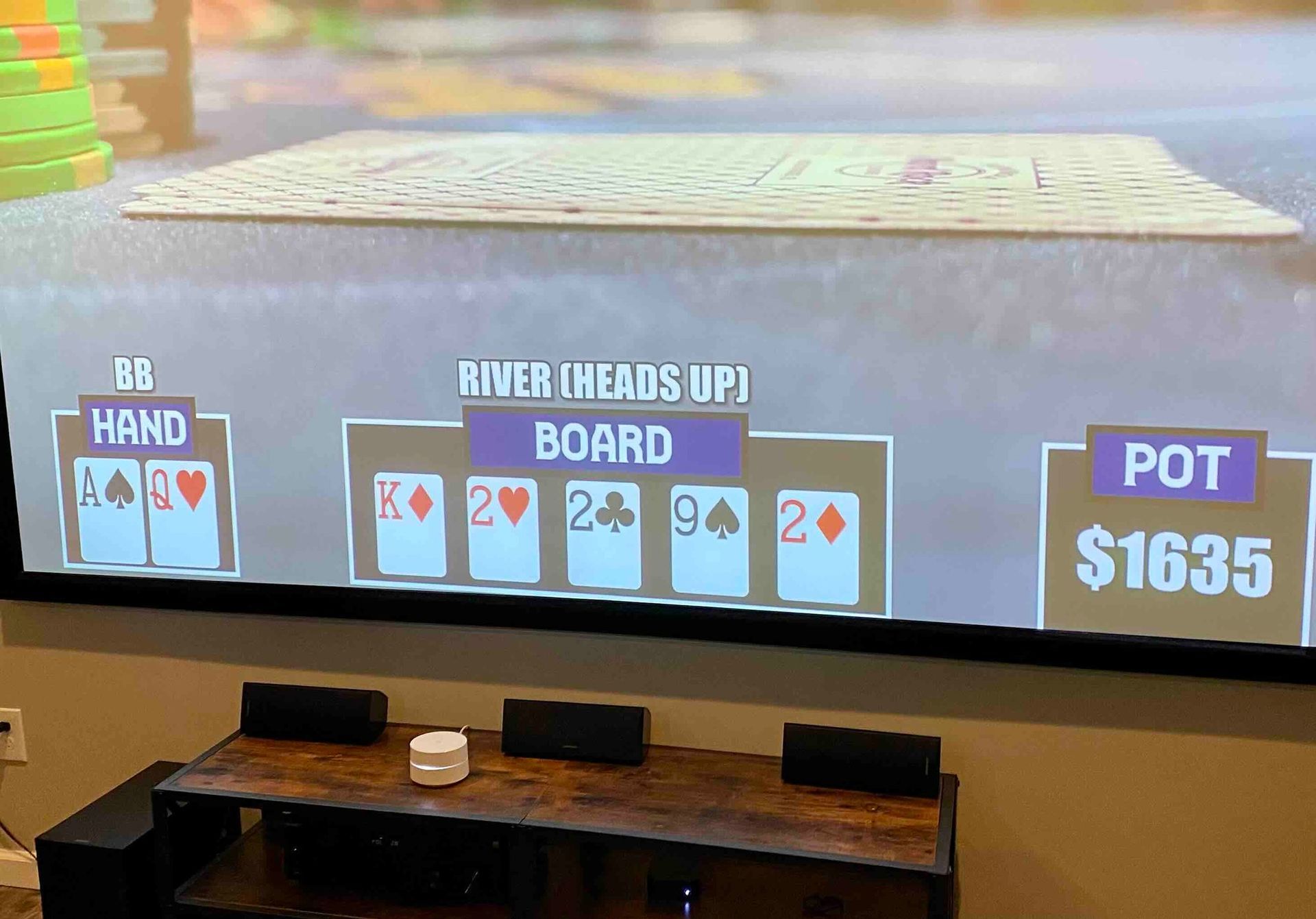 a video game is being played on a newly installed large TV screen .