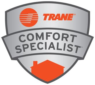 Silver shield logo with the orange Trane logo, the text "COMFORT SPECIALIST," and an orange house silhouette at the bottom.