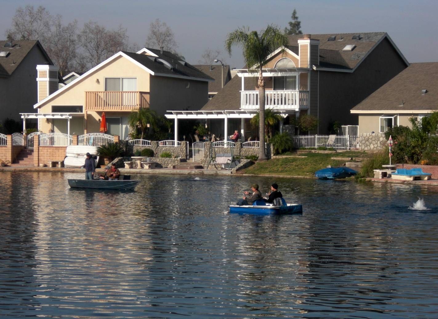 lake with people in boats