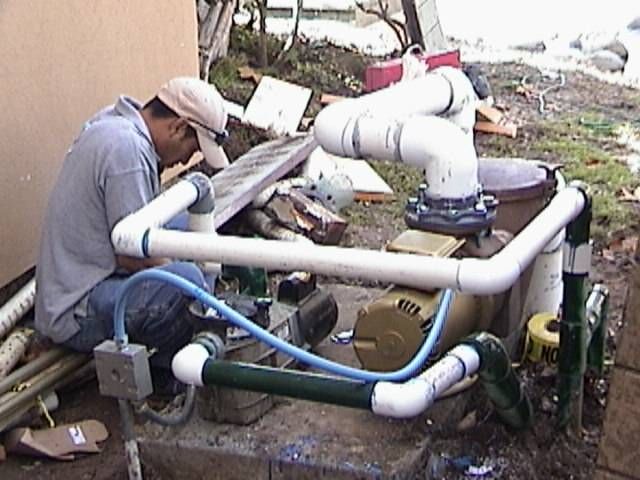 Water Recreation employee working on pipework
