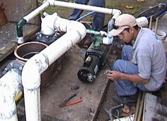 Water Recreation employee working on pipework
