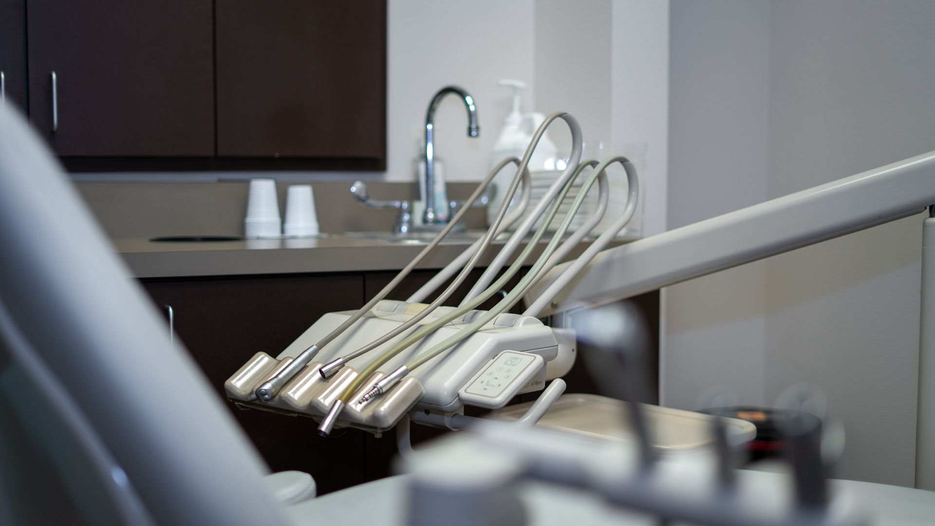 A close up of a dental chair in a dental office.