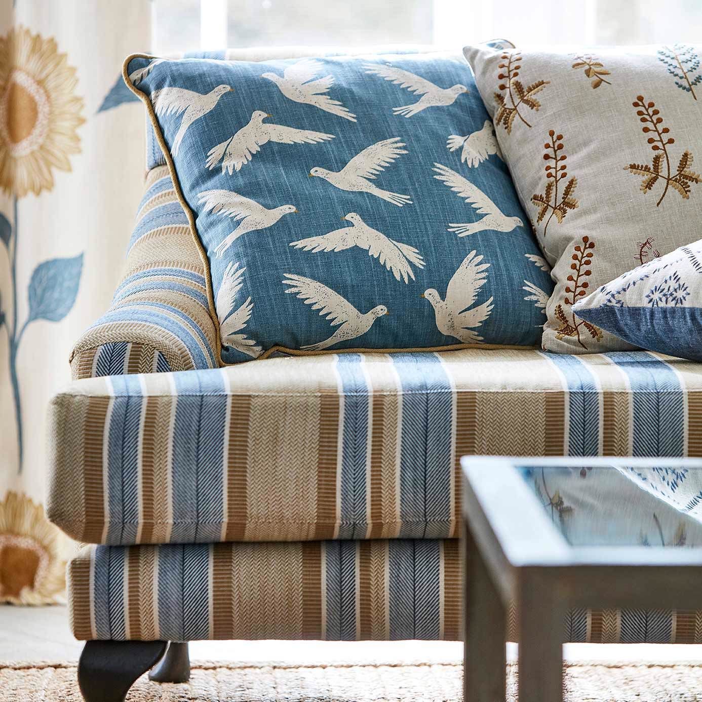 A Person Is Fixing A Chair With Their Hands — Gaeta's Upholstery Blinds & Awnings in Glen Innes, NSW