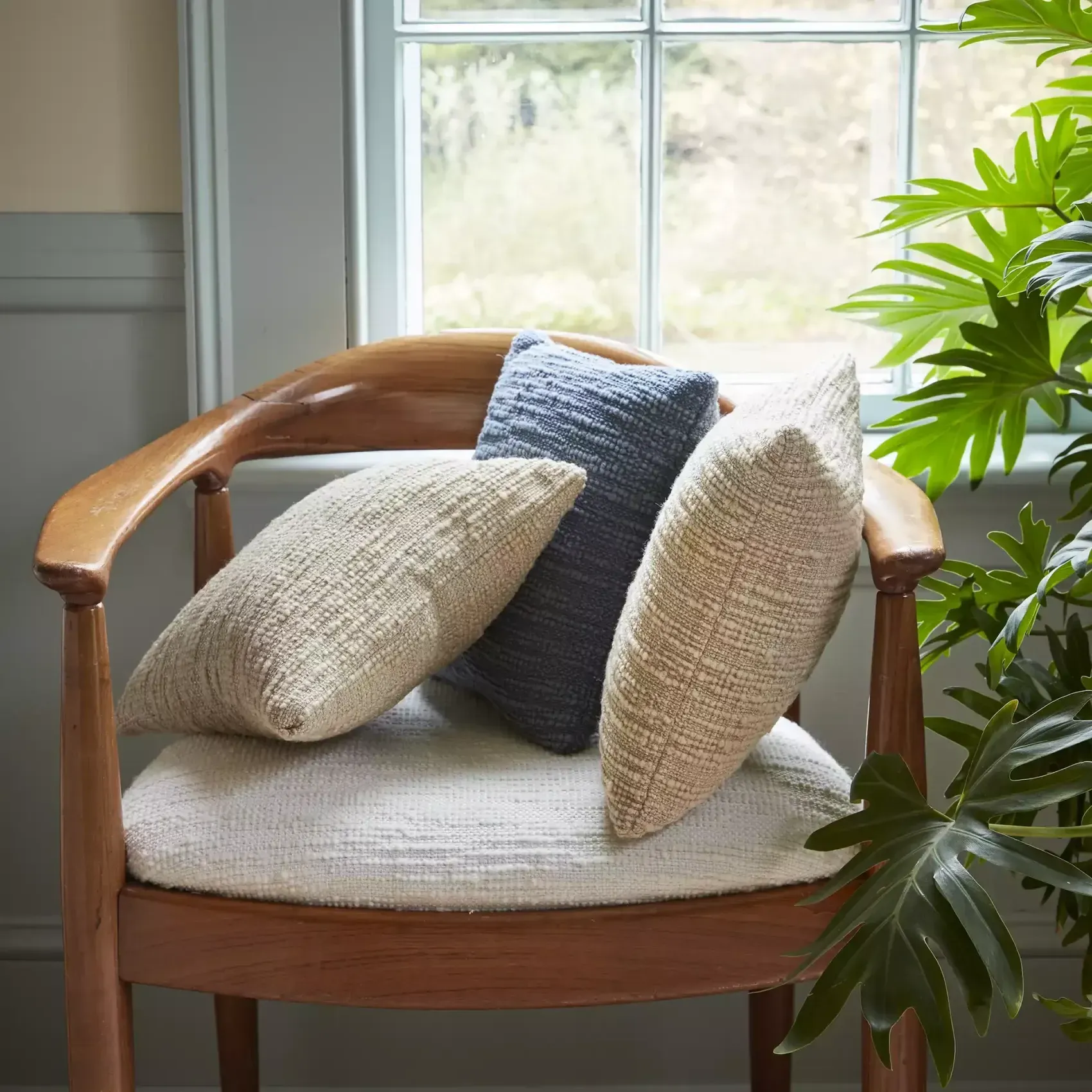 A Patio With A Table And Chairs Under A Shade Sail — Gaeta's Upholstery Blinds & Awnings in Grafton, NSW