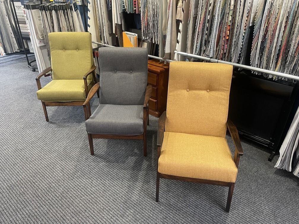 A Patio With A Table And Chairs Under A Shade Sail — Gaeta's Upholstery Blinds & Awnings in Grafton, NSW