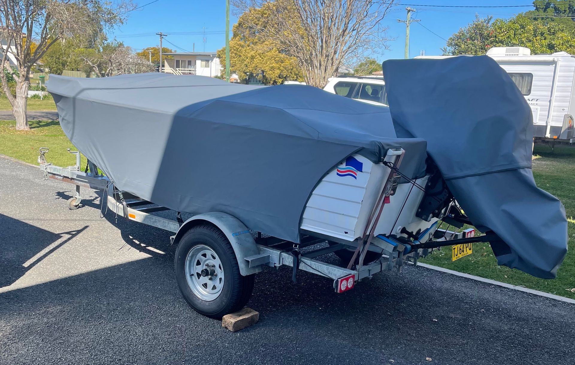 A Living Room On A Boat With A Table And Chairs — Gaeta's Upholstery Blinds & Awnings in Glen Innes, NSW