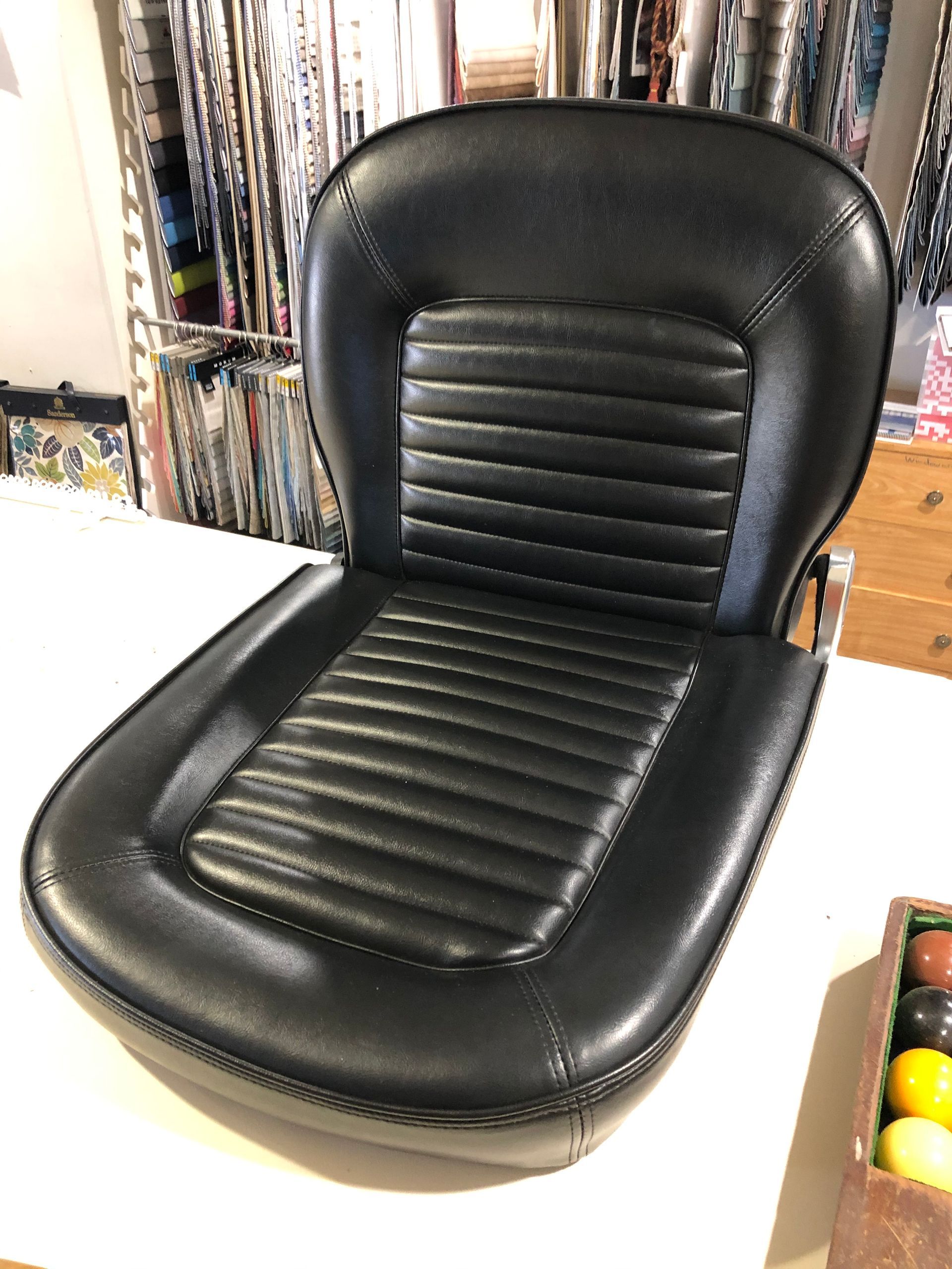 A Living Room On A Boat With A Table And Couch — Gaeta's Upholstery Blinds & Awnings in Grafton, NSW