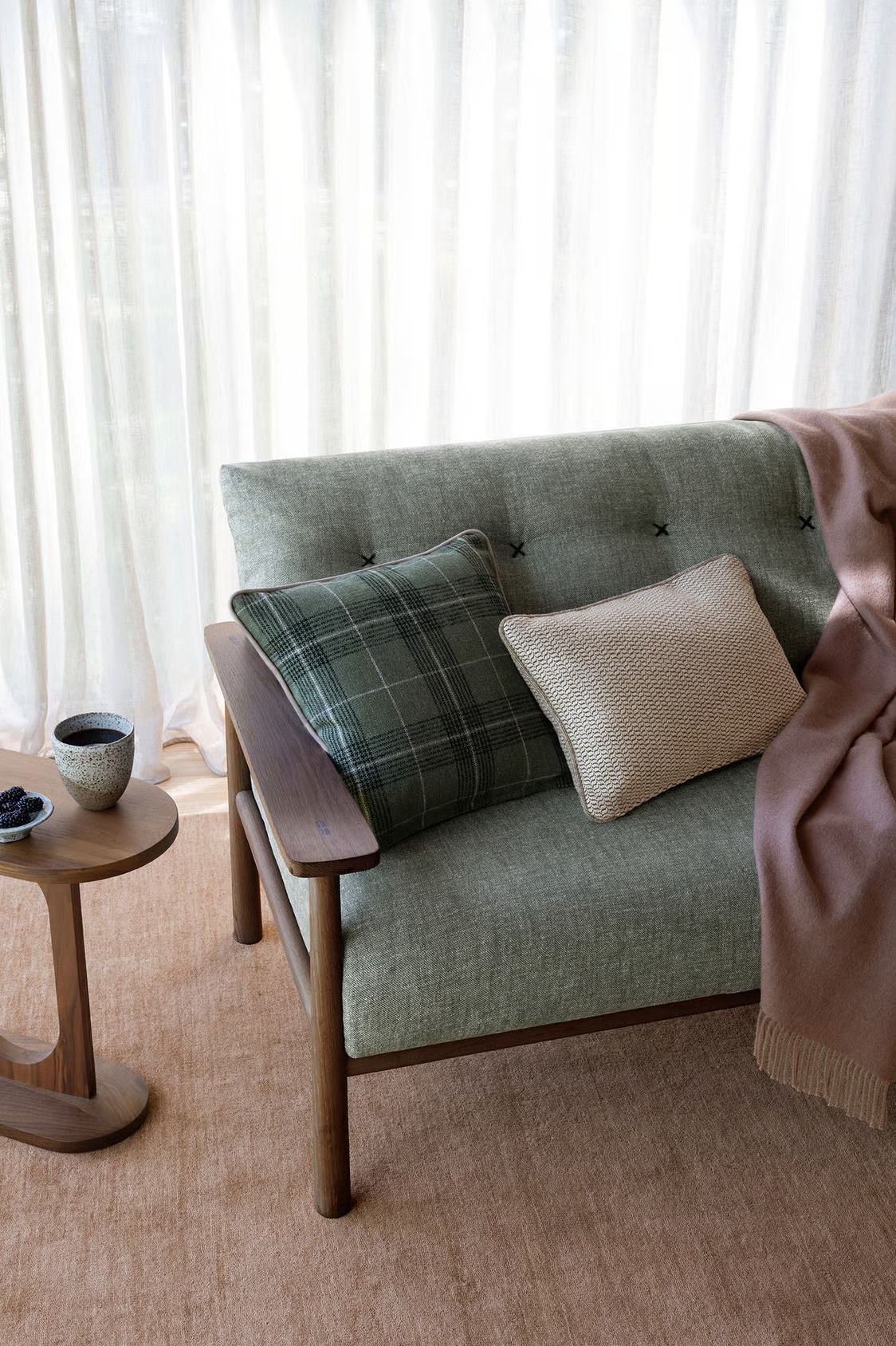 A Close Up Of A Grey Couch With Buttons On It — Gaeta's Upholstery Blinds & Awnings in Grafton, NSW
