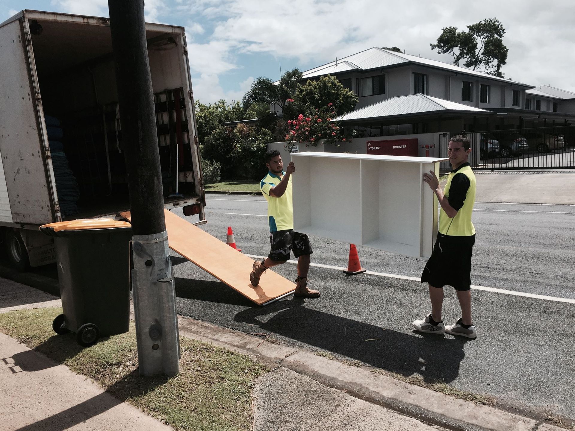 White Delivery Van Parked With Rear Door Open — Cairns Mini Movers In Mount Sheridan, QLD
