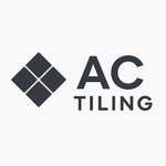 Logo for AC Tiling featuring a diamond-shaped tile design and the words "AC TILING" in dark gray.