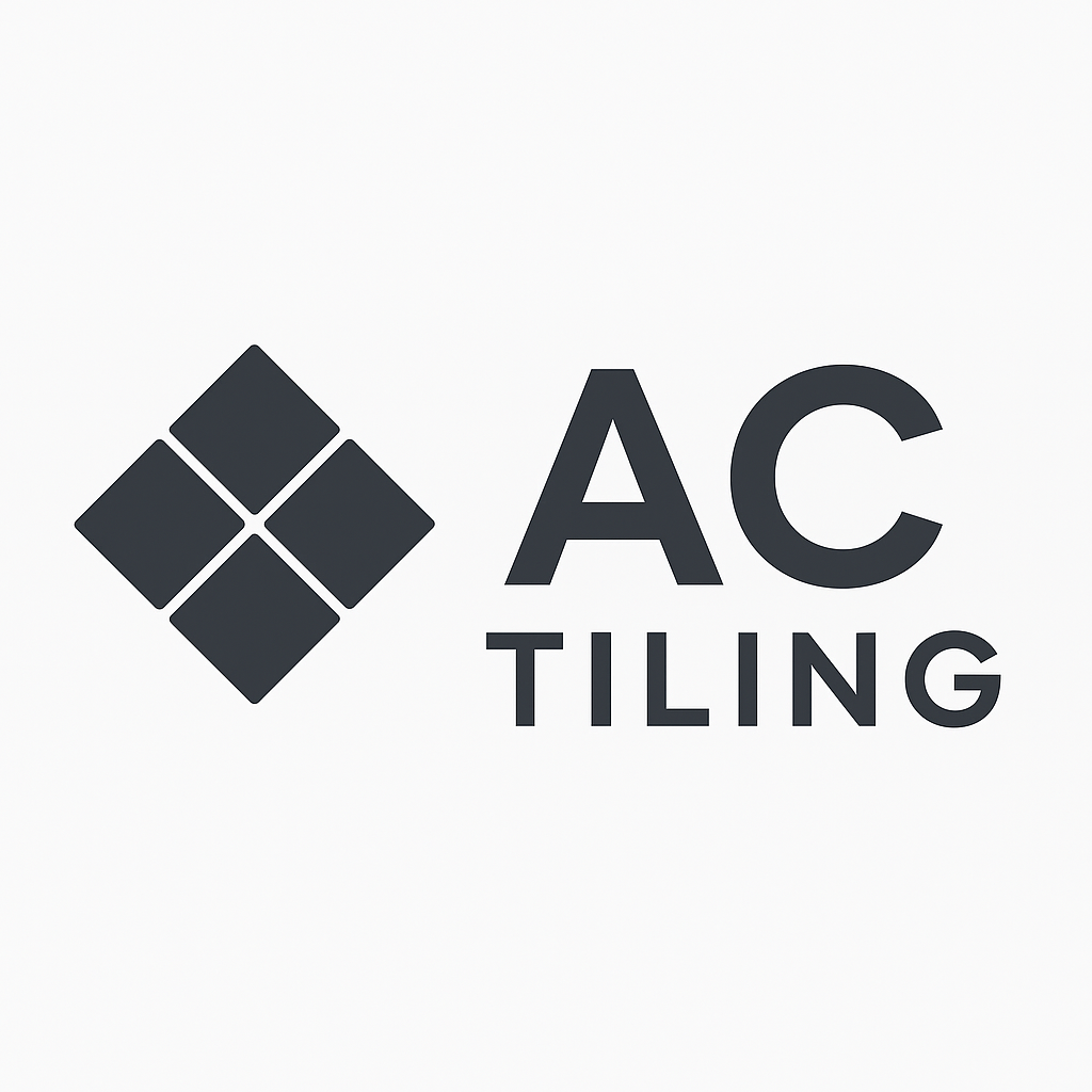 Logo for AC Tiling featuring a diamond-shaped tile design and the words "AC TILING" in dark gray.