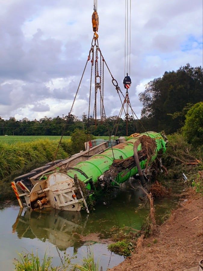 Big truck being pulled up by a crane — Commercial Diving Mid North Coast , NSW