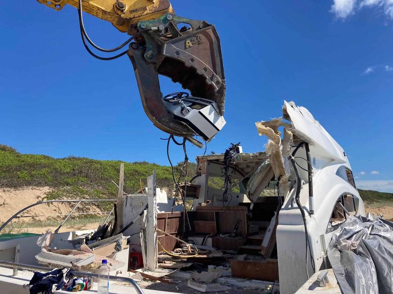 collecting boat wreckage