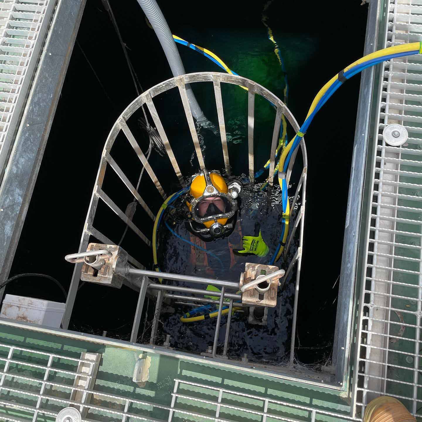 Professional diver preparing for underwater work