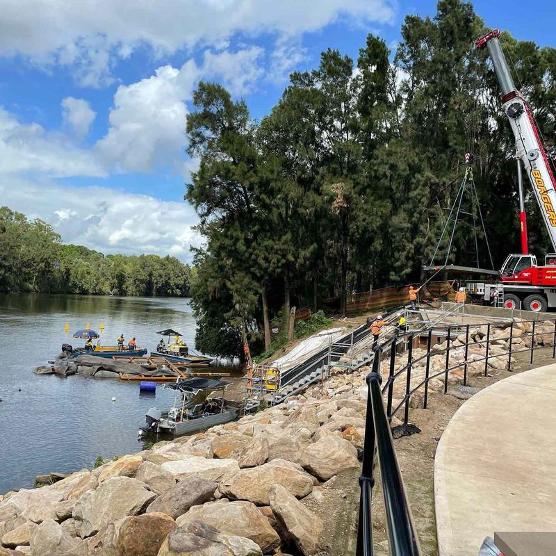 Crane lifting vehicle from water