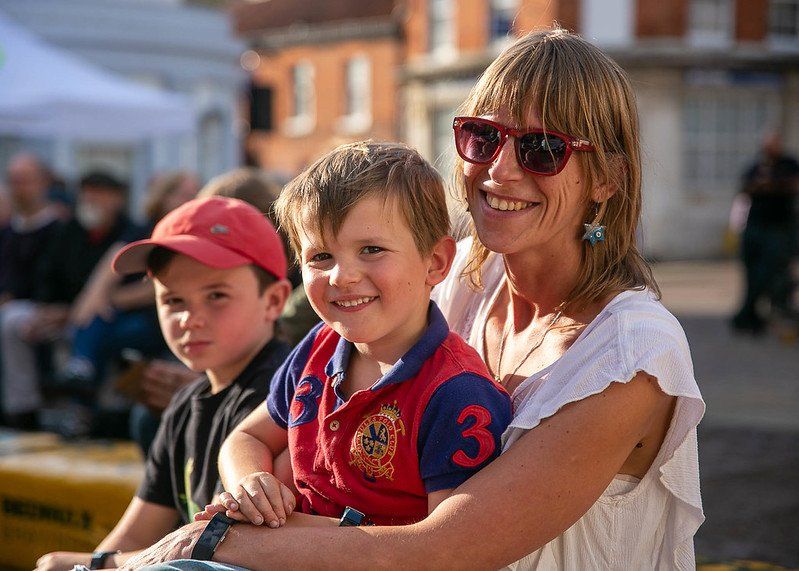 Mother and son enjoying the music at Fakenham Music Festival