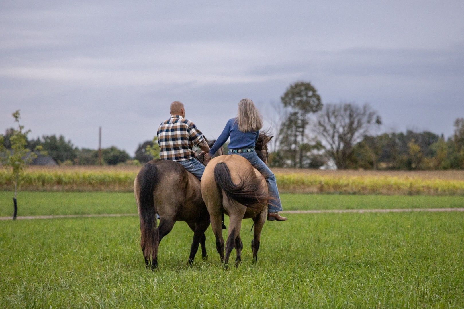 Couple Riding Horses