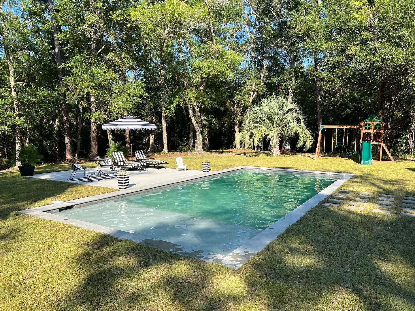 A large swimming pool installed by Caroline Pool Plastering in Charlotte, NC