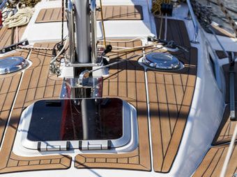 Teak desk install on monohull