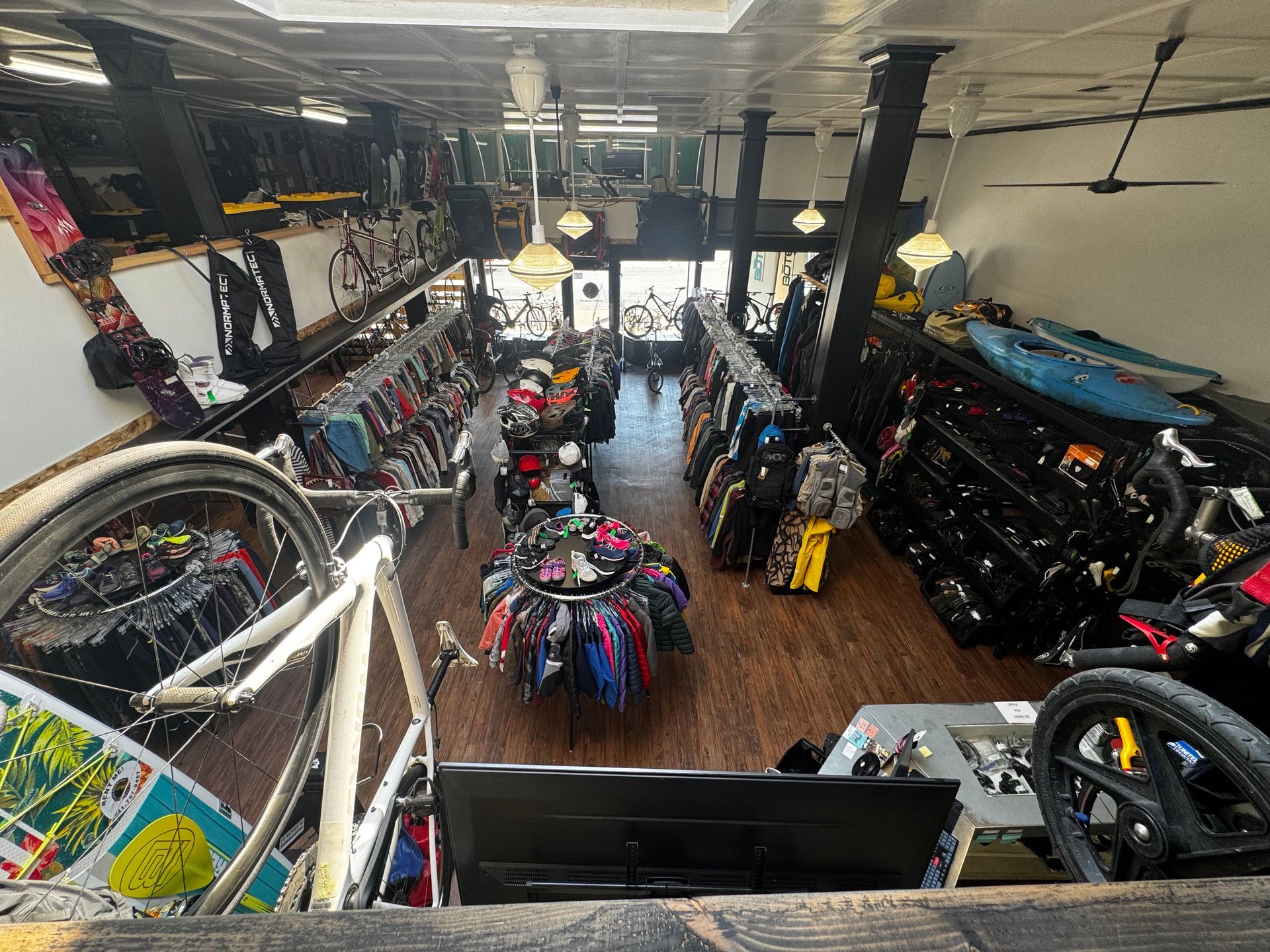 An aerial view of a clothing store filled with lots of clothes.