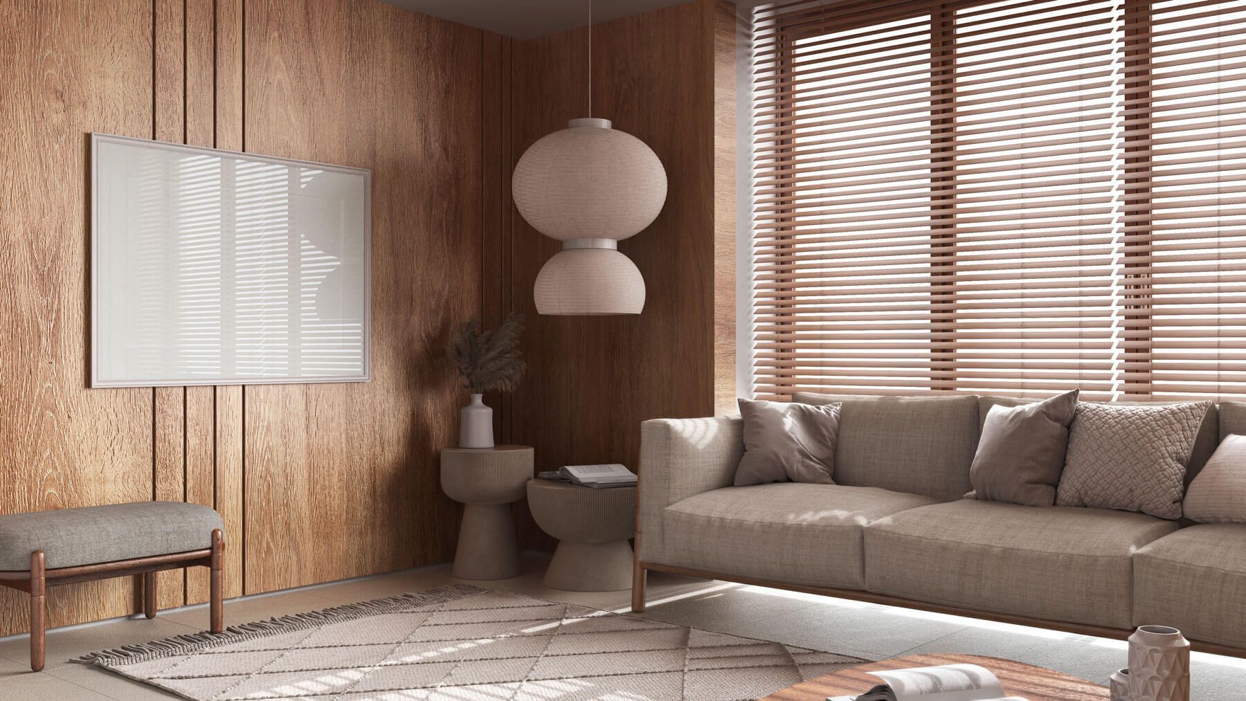 Una sala de estar con sofá, mesa y televisión.