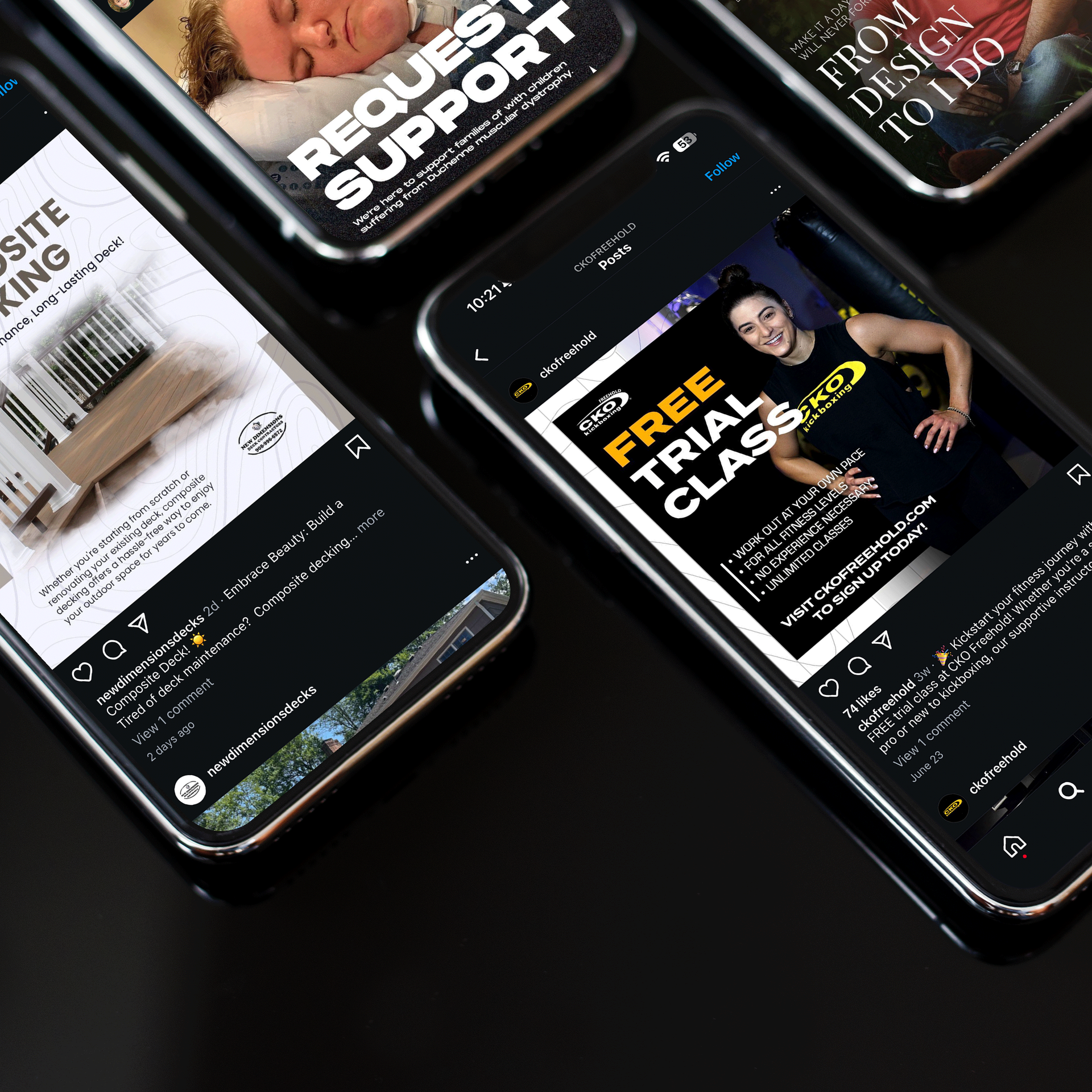 A group of cell phones are laying on top of each other on a table.