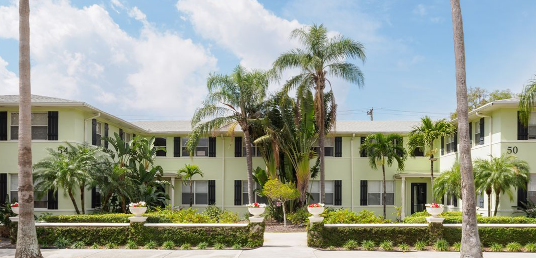 Photo showing the courtyard area of the building, and surrounding unit entrances