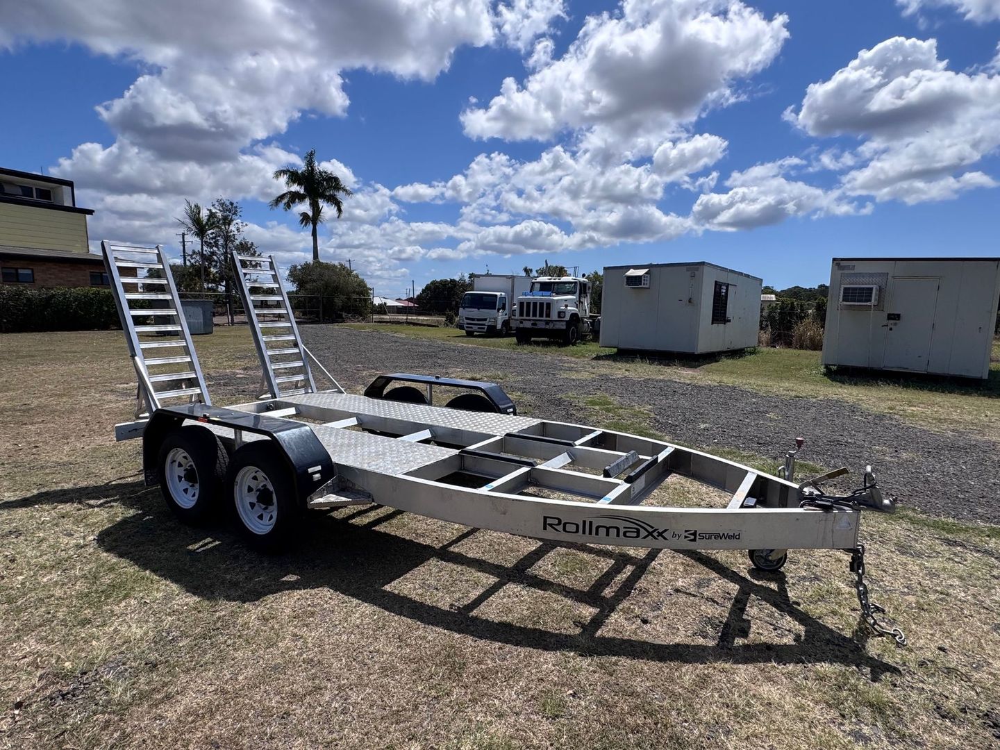 Empty Silver Car Trailer on A Sunny Day — Bundaberg Auction Centre in Gooburrum, QLD
