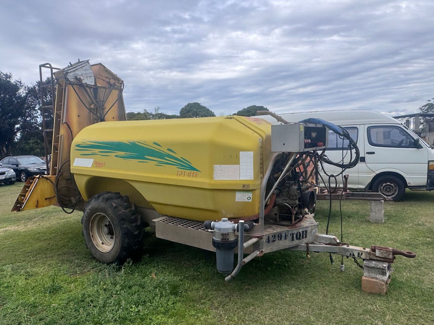 Yellow Agricultural Sprayer on A Trailer — Bundaberg Auction Centre in Gooburrum, QLD