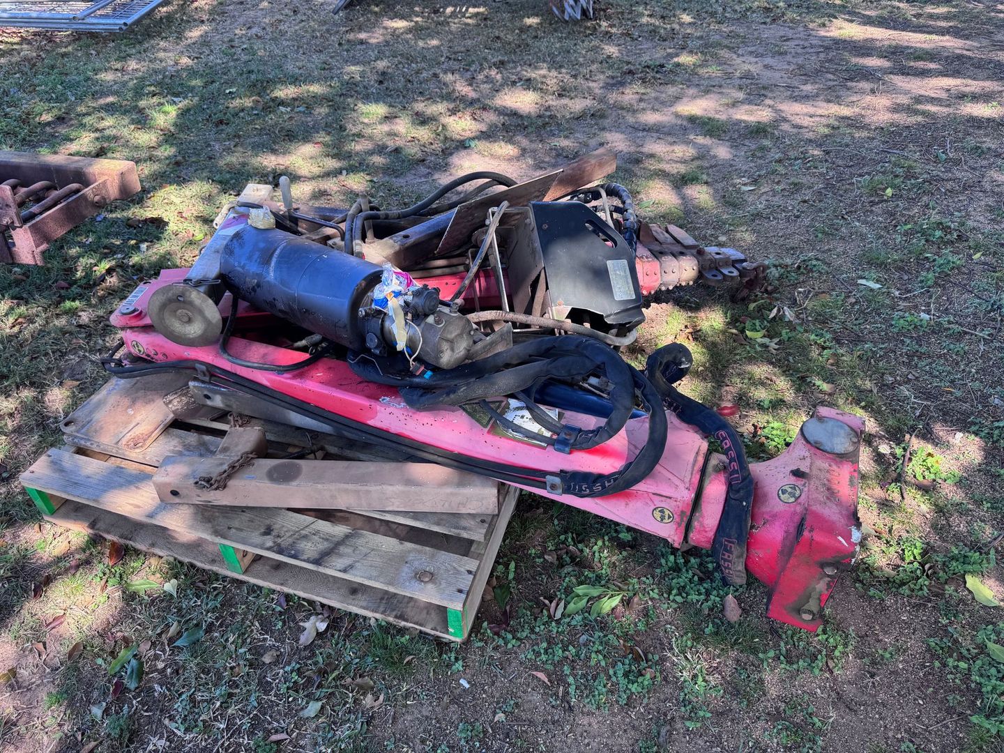 Pile of Dismantled Red Machinery  — Bundaberg Auction Centre in Gooburrum, QLD