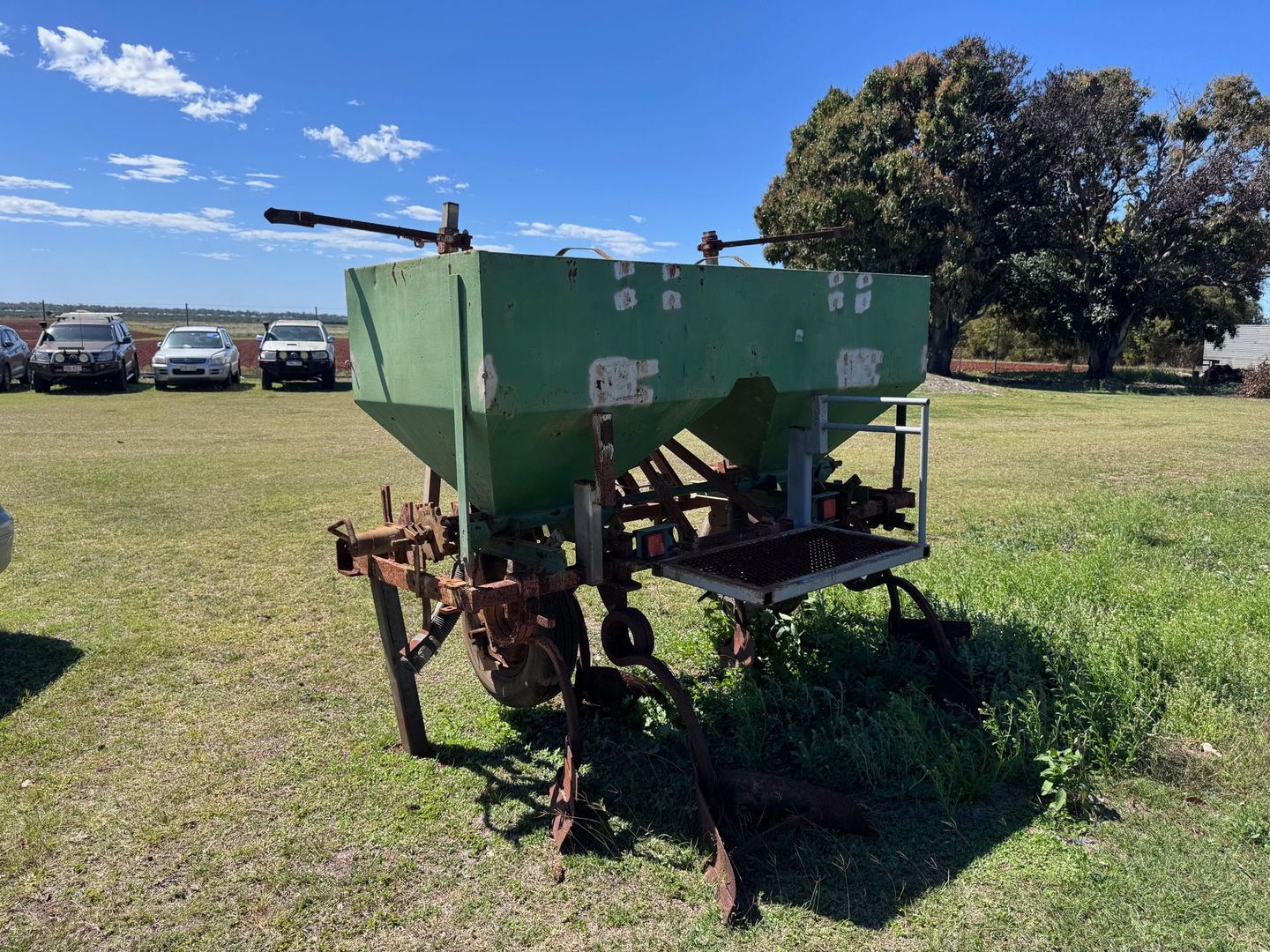 Green Farm Seeder in A Grassy Field — Bundaberg Auction Centre in Gooburrum, QLD