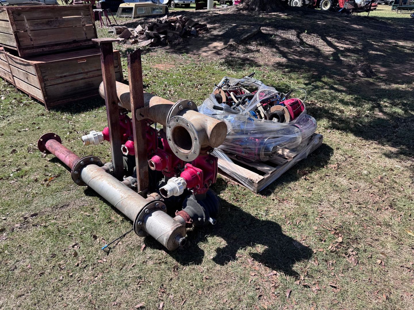 Rusty Industrial Equipment Parts on A Grassy Field — Bundaberg Auction Centre in Gooburrum, QLD