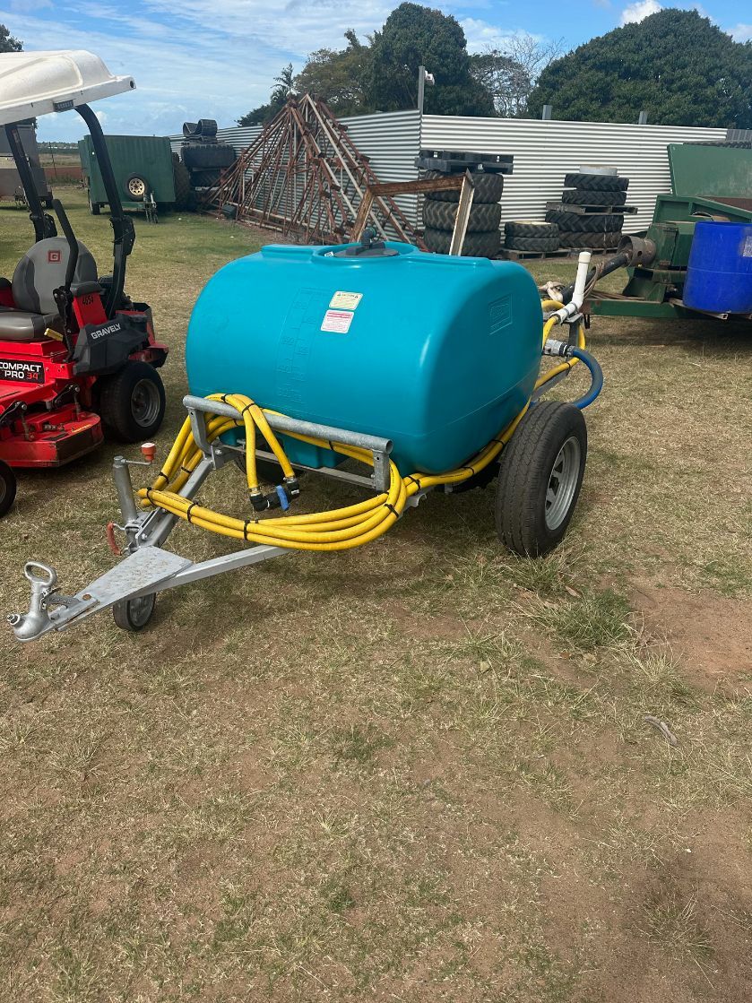 A Blue Water Tank on A Trailer — Bundaberg Auction Centre in Gooburrum, QLD