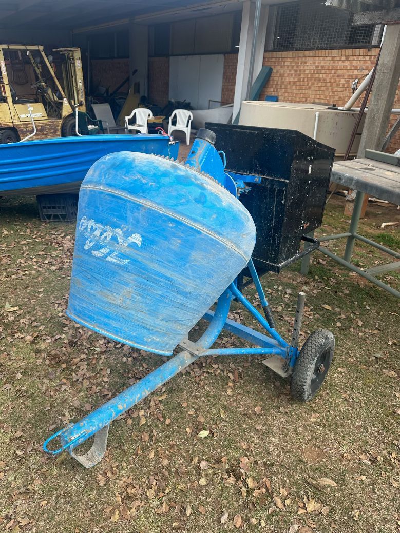 Blue Cement Mixer on Wheels Outdoors — Bundaberg Auction Centre in Gooburrum, QLD