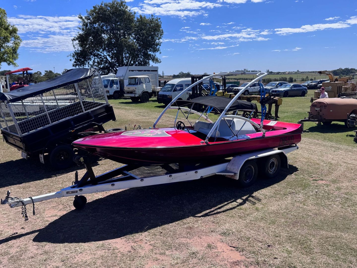 Red Speedboat on Trailer at Outdoor Event — Bundaberg Auction Centre in Gooburrum, QLD