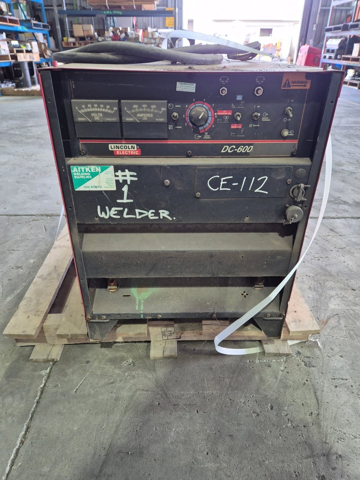 Black Lincoln DC-400 Welder on A Pallet — Bundaberg Auction Centre in Gooburrum, QLD