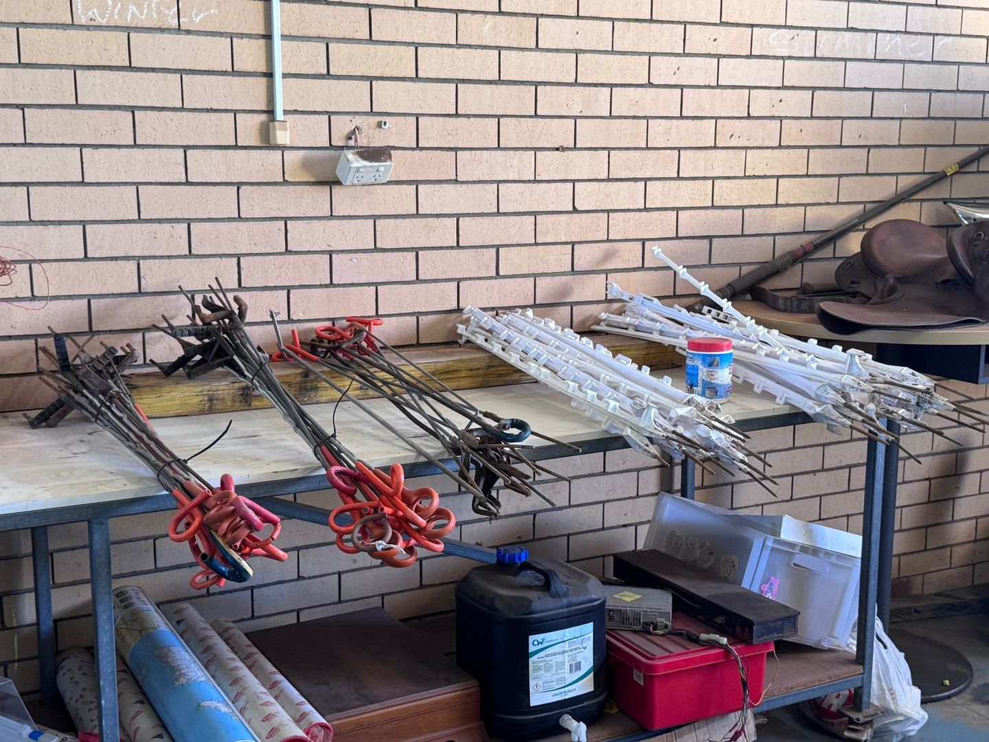 Metal Tools with Red and White Handles on A Workbench — Bundaberg Auction Centre in Gooburrum, QLD