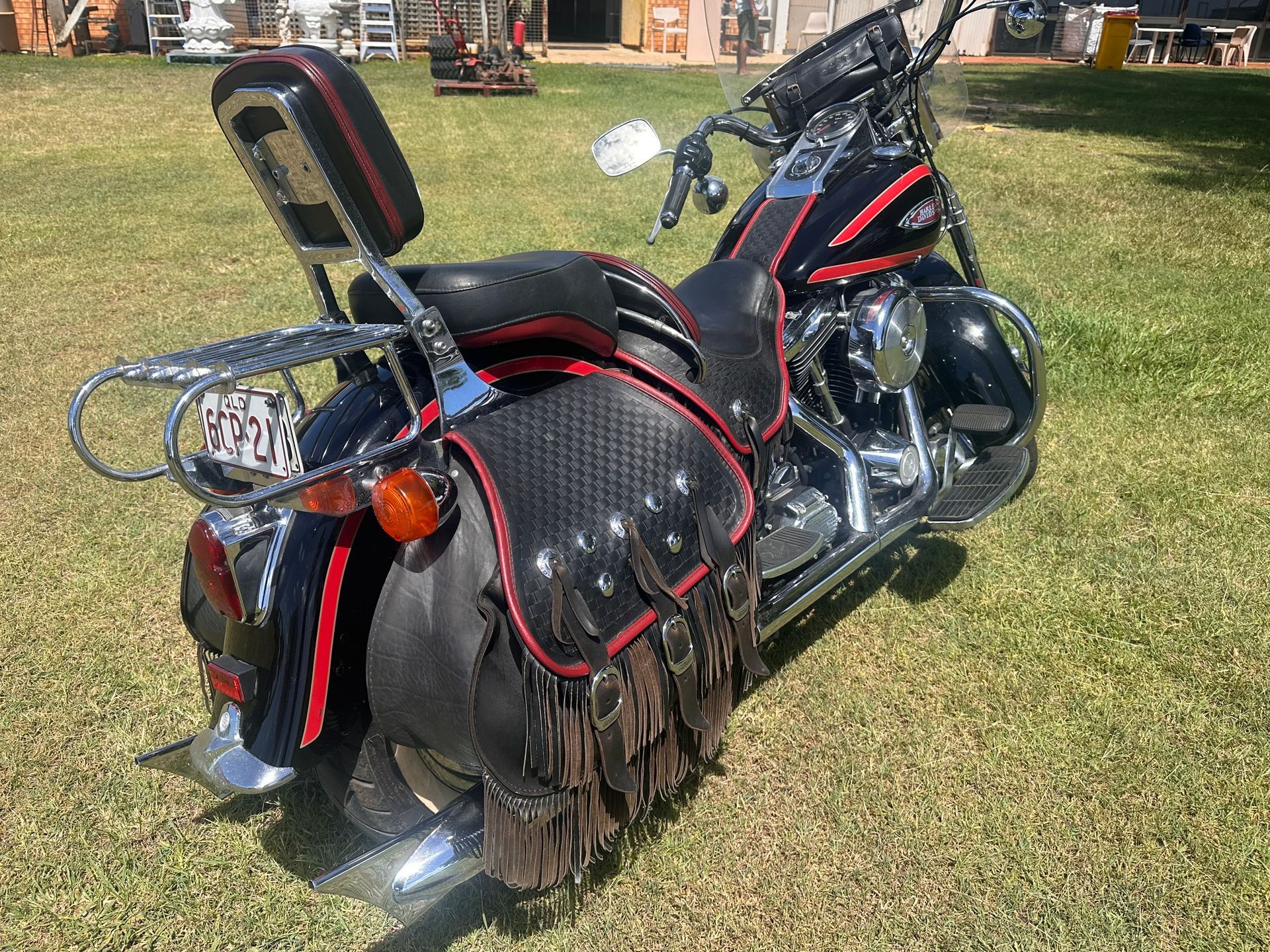 Black and Chrome Motorcycle with Red Accents — Bundaberg Auction Centre in Gooburrum, QLD