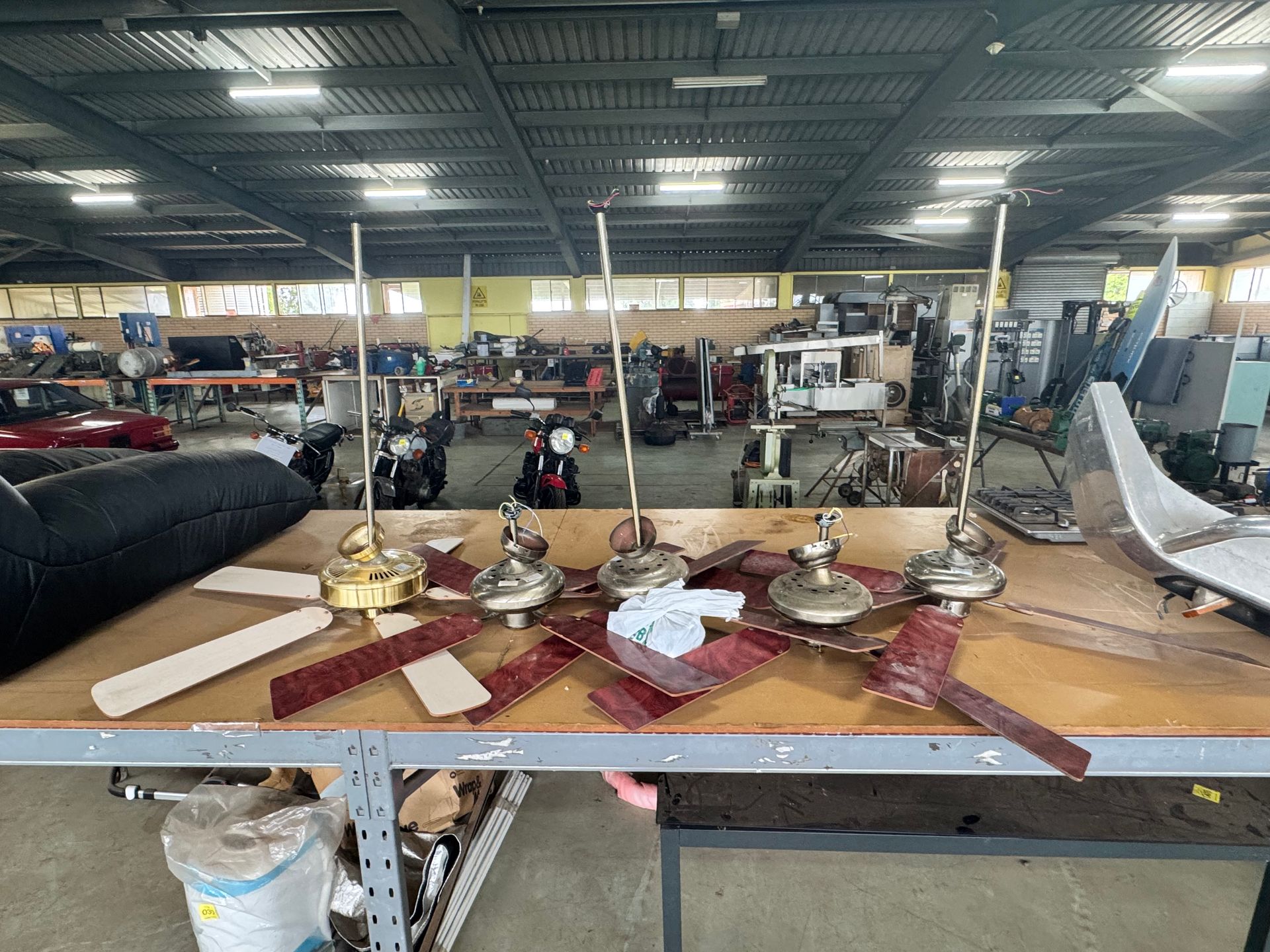 Overhead Fans Disassembled on A Workbench — Bundaberg Auction Centre in Gooburrum, QLD