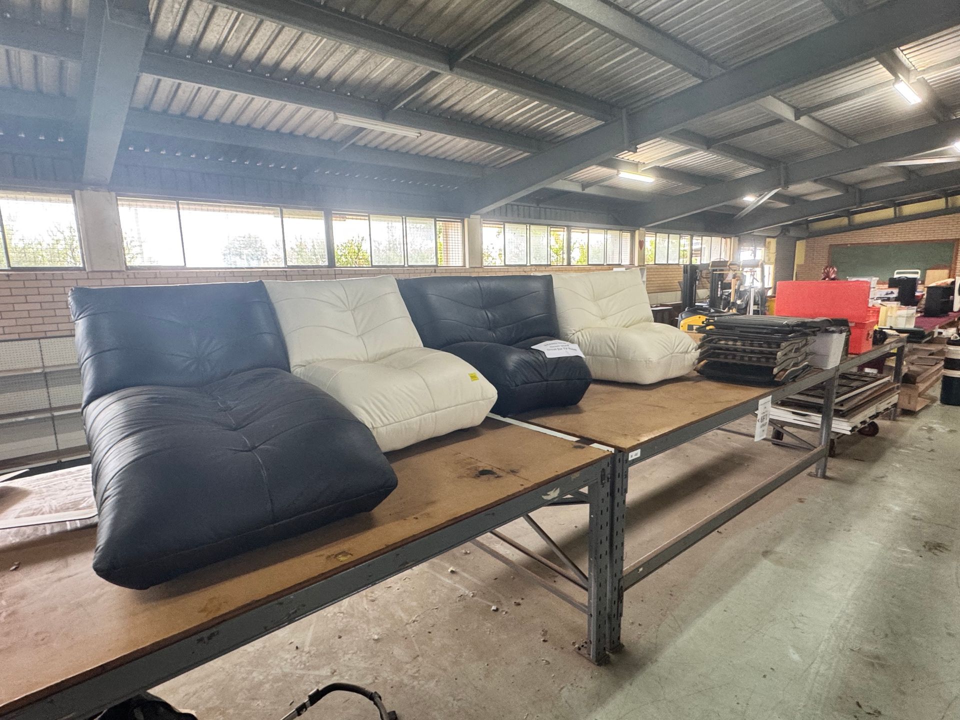 Four Beanbag Chairs, Black and White, Sit on A Wood Table — Bundaberg Auction Centre in Gooburrum, QLD