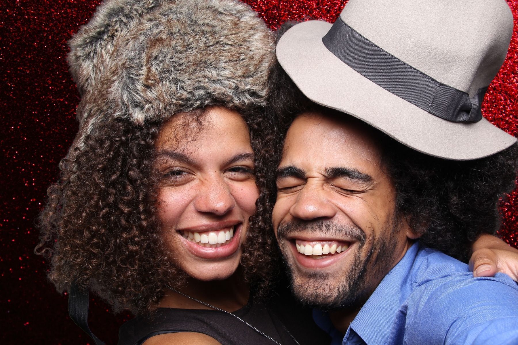 engaged couple posing in photo booth at wedding fair in modesto, california