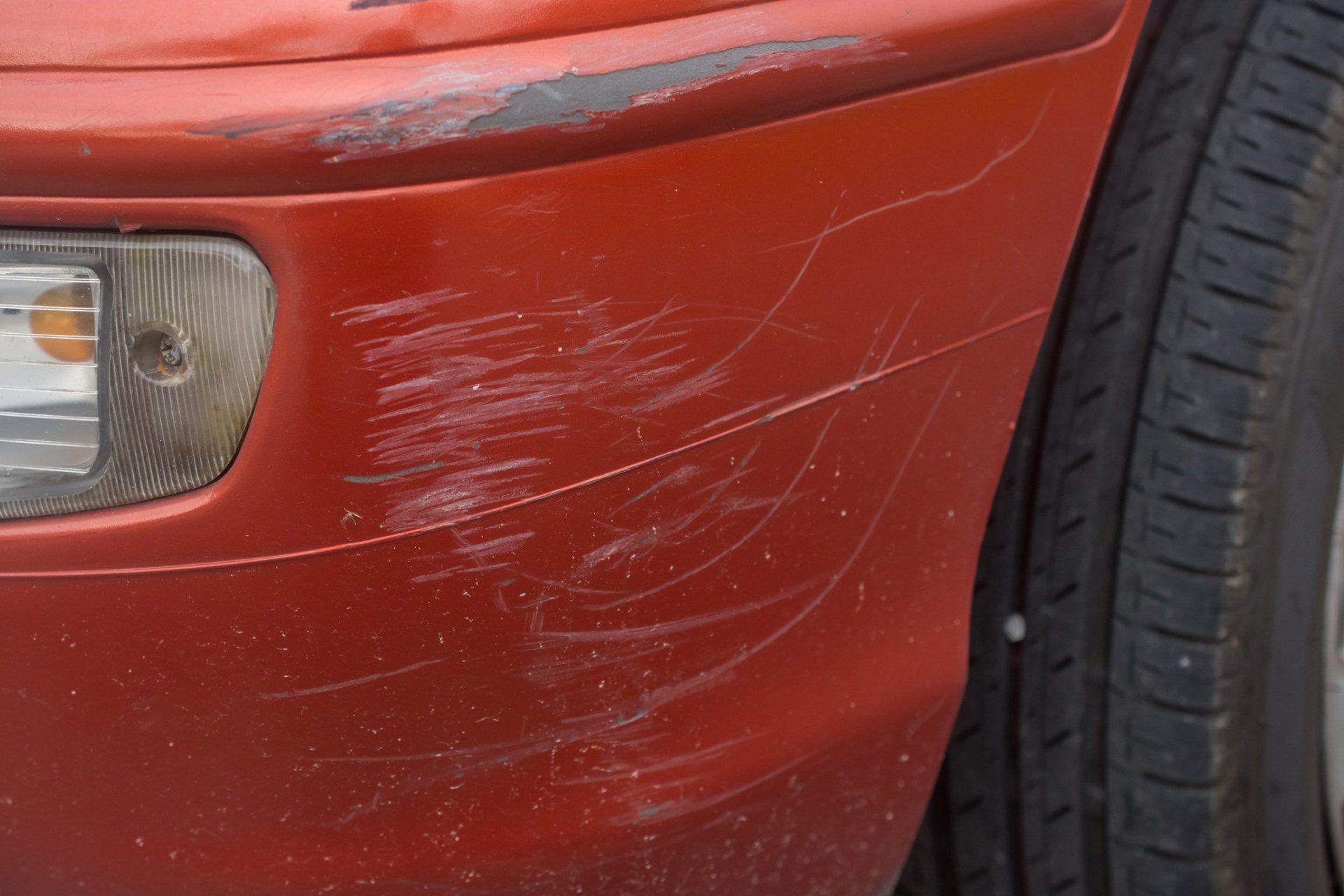 Red Bumper Car Scratched - Sidney, NE - Pittam Body Shop Inc.