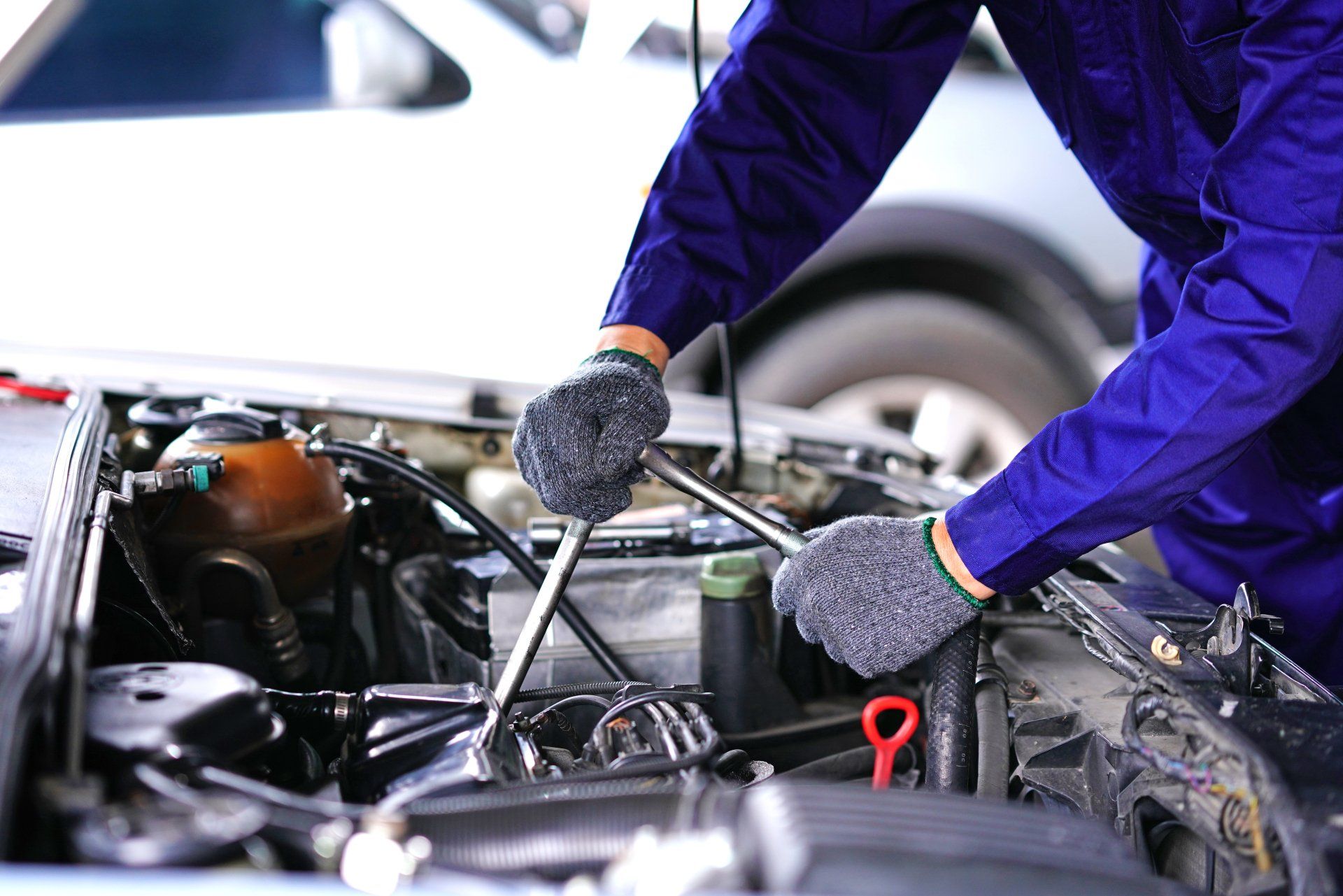 Auto Mechanic Using Repair Tools Check Car - Sidney, NE - Pittam Body Shop Inc.