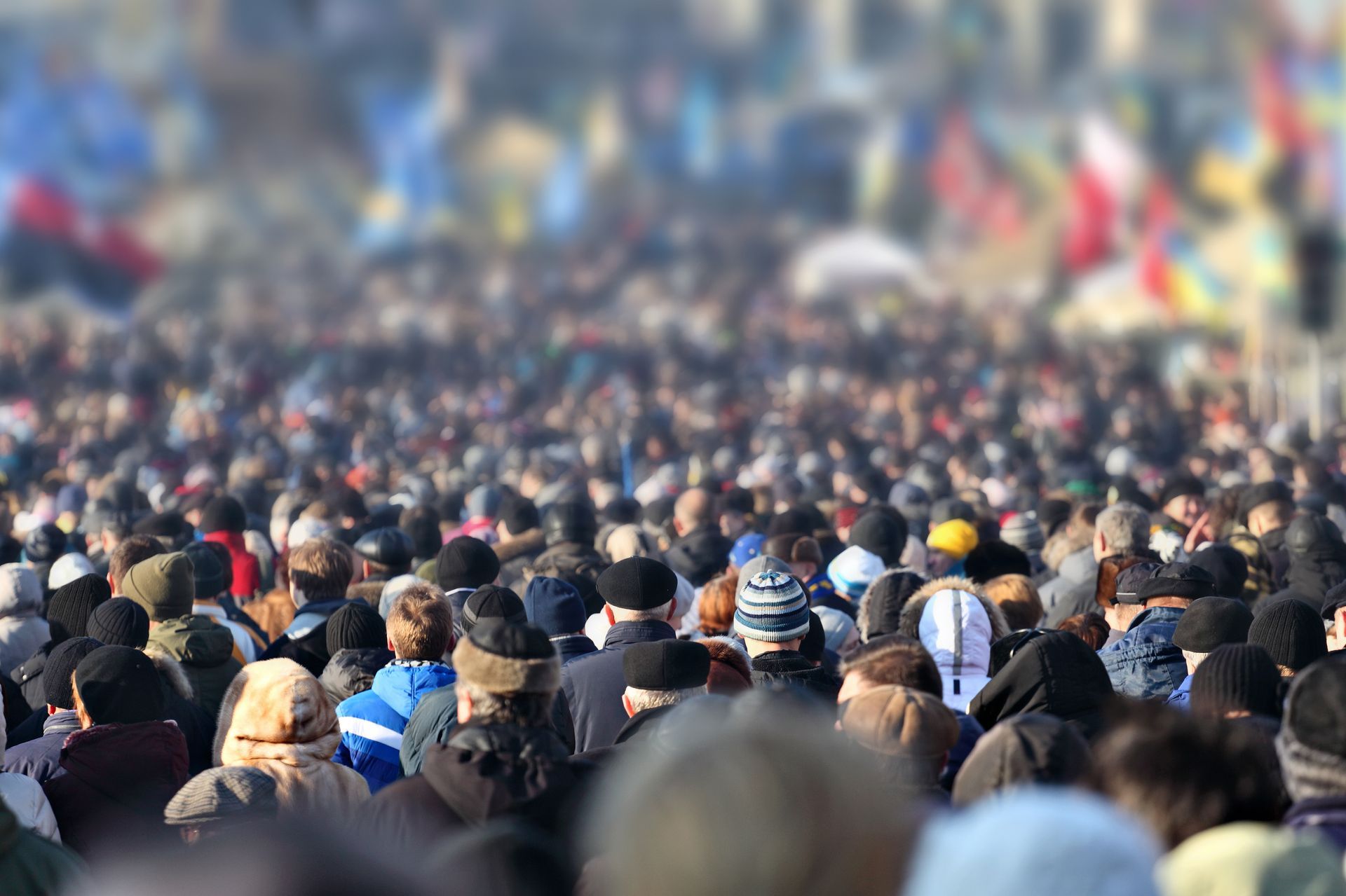 A large crowd of people are gathered in a stadium.